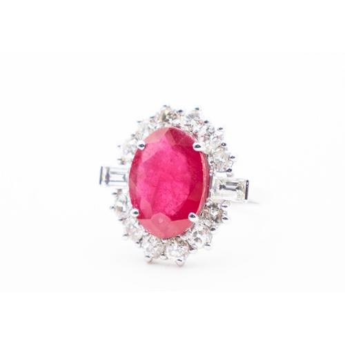 155 - Ruby Centre Stone Ring with Round Cut and Baguette Cut Diamond Halo Surround Set in Platinum Ring Si... 