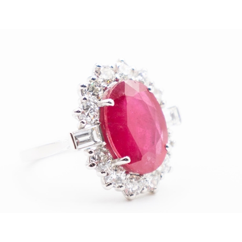 155 - Ruby Centre Stone Ring with Round Cut and Baguette Cut Diamond Halo Surround Set in Platinum Ring Si... 