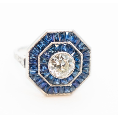 16 - Diamond and Sapphire Panel Set Ring Octagonal Form Centre Diamond 0.96 Carat Finely Incised Detailin... 