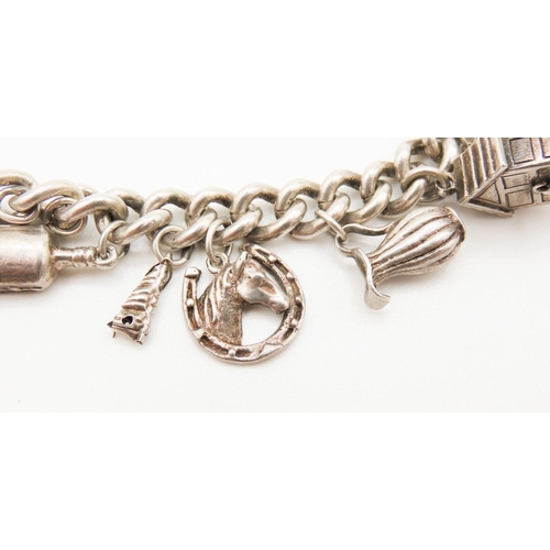 164 - Silver Charm Bracelet 19.5cm Long