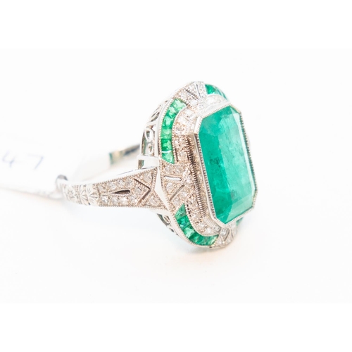 17 - Emerald and Diamond Set Ring Total Emerald Carat Weight 4.21 Carat Total Diamond Weight .35 Carat Fi... 