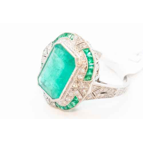 17 - Emerald and Diamond Set Ring Total Emerald Carat Weight 4.21 Carat Total Diamond Weight .35 Carat Fi... 