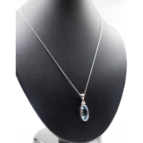 201 - Oval Cut Bezel Set Aquamarine and Diamond Set Pendant Mounted in 18 Carat White Gold 3cm High Furthe... 