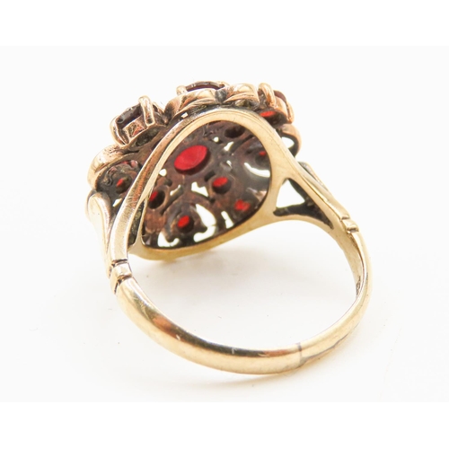 24 - Red Garnet Cluster Ring Heart Shaped Setting Mounted in 9 Carat Yellow Gold Ring Size M