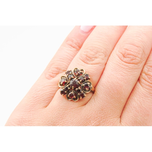 24 - Red Garnet Cluster Ring Heart Shaped Setting Mounted in 9 Carat Yellow Gold Ring Size M