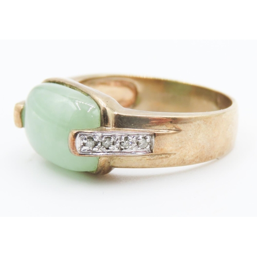 247 - Half Bezel Set Jade Centre Stone Ring Further Diamonds Set to Shoulders Mounted in 9 Carat Yellow Go... 