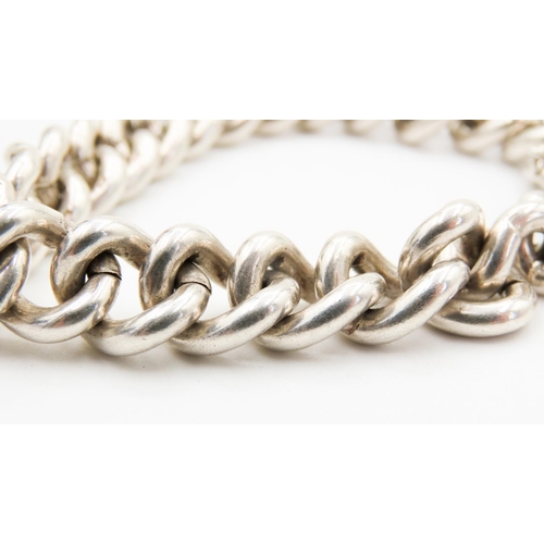 257 - Silver Curb Link Bracelet with Heart Form Clasp and Safety Chain 17cm Long