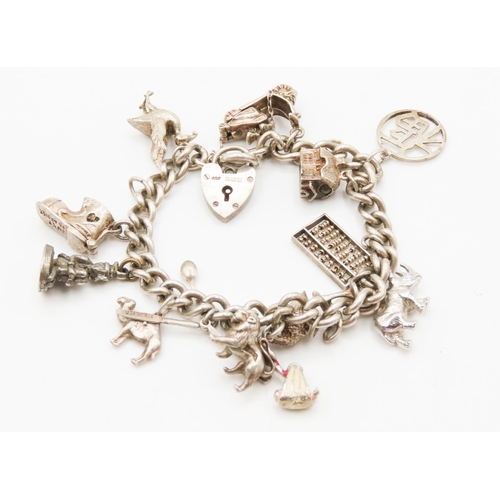 260 - Silver Charm Bracelet with Heart Form Clasp and Safety Chain Present 17.5cm Long