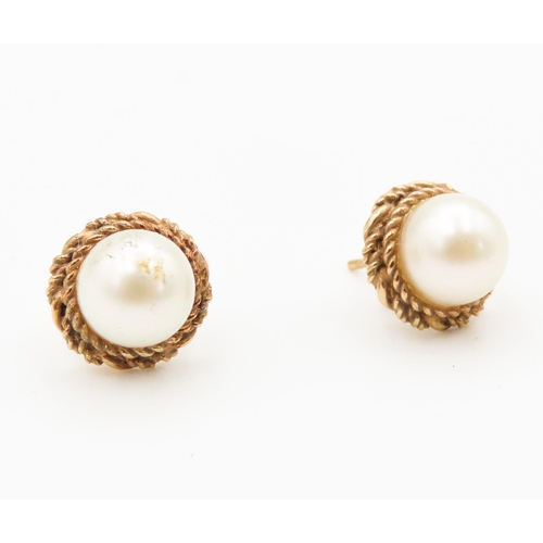 267 - Pair of 9 Carat Yellow Gold Pearl Set Earrings Braid Motif Surround  Pearls Each 7mm Diameter