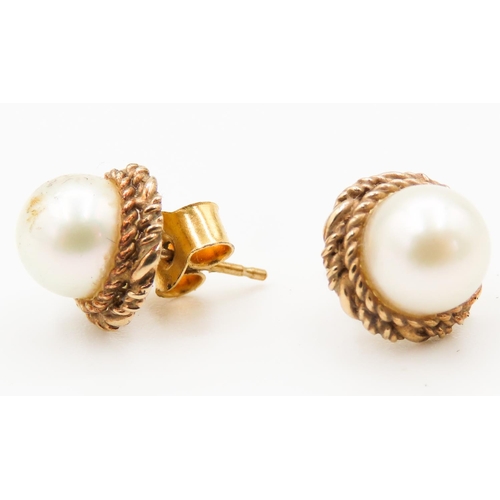 267 - Pair of 9 Carat Yellow Gold Pearl Set Earrings Braid Motif Surround  Pearls Each 7mm Diameter