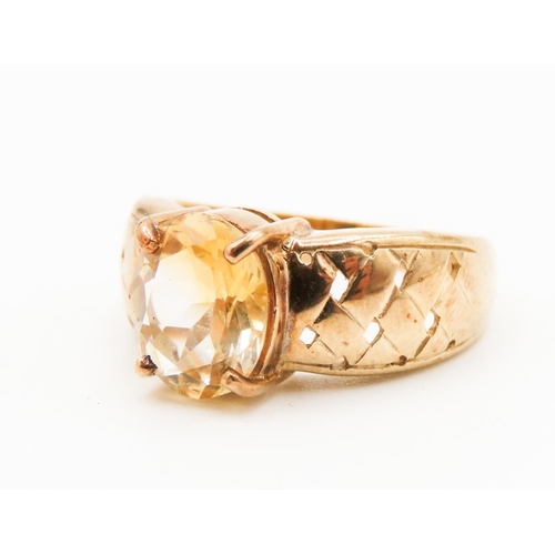 269 - 9 Carat Yellow Gold Four Claw Citrine Single Stone Ring Weave Motif Band Ring Size N and a Half