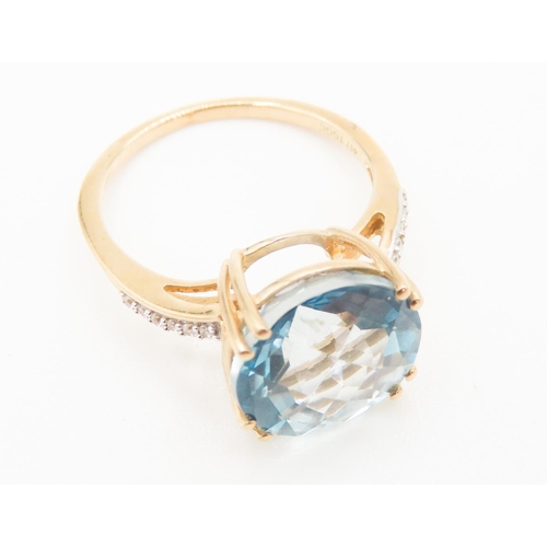 285 - Facet Cut Sky Blue Topaz Solitaire Ring Mounted in 10 Carat Yellow Gold Further Diamonds Set to Shou... 