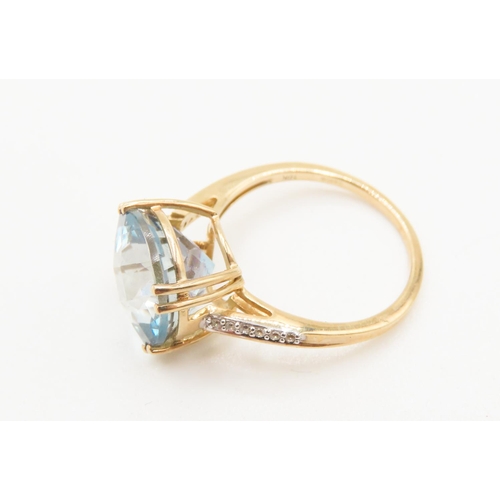 285 - Facet Cut Sky Blue Topaz Solitaire Ring Mounted in 10 Carat Yellow Gold Further Diamonds Set to Shou... 