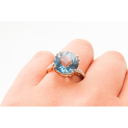 285 - Facet Cut Sky Blue Topaz Solitaire Ring Mounted in 10 Carat Yellow Gold Further Diamonds Set to Shou... 