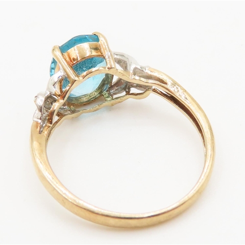 292 - Blue Topaz Centre Stone Ring Set in 9 Carat Yellow Gold Diamonds Set to Shoulder Ring Size Q