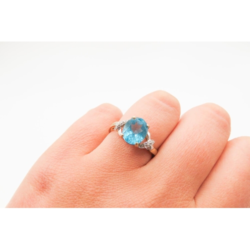 292 - Blue Topaz Centre Stone Ring Set in 9 Carat Yellow Gold Diamonds Set to Shoulder Ring Size Q