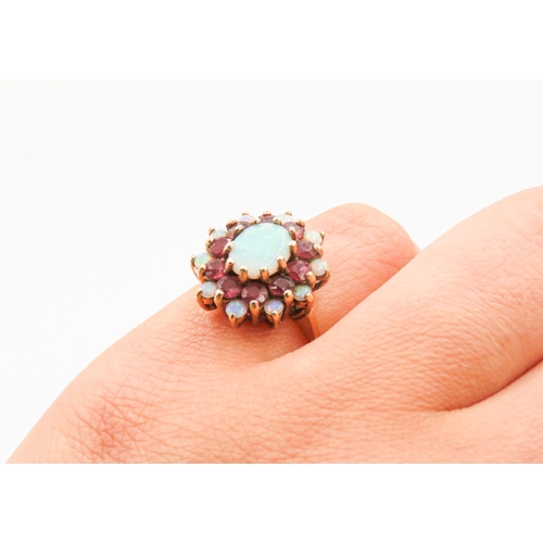 30 - Opal Centre Stone Ring with Further Ruby and Opal Halo Setting Mounted in 9 Carat Yellow Gold Ring S... 