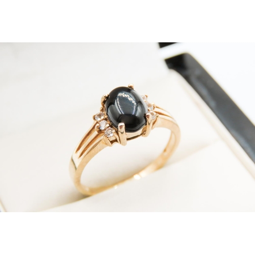 309 - Onyx and Gemstone Set Ring Mounted in 9 Carat Yellow Gold Ring Size O