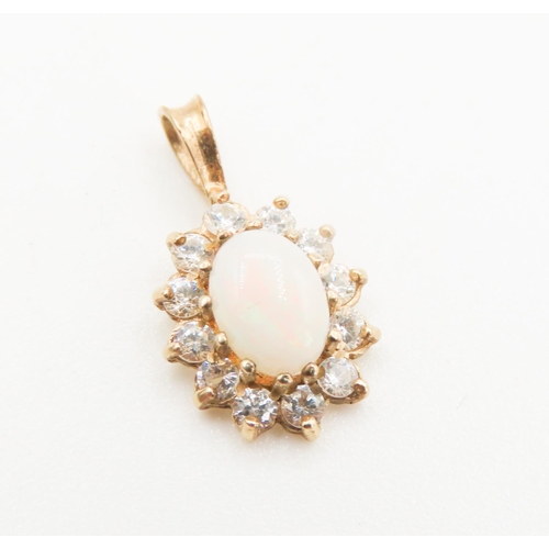 317 - Opal and Gemstone Set Pendant Mounted in 9 Carat Yellow Gold 2cm High