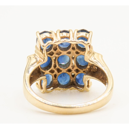 33 - Nine Stone Sapphire Set Ring Mounted in 9 Carat Yellow Gold Diamond Inset to Shoulders Ring Size N a... 