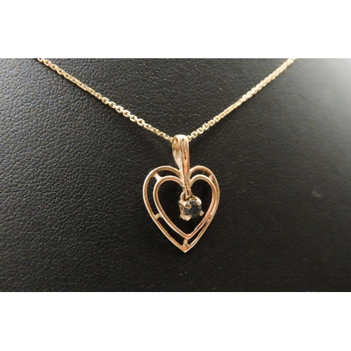 388 - Sapphire Set 9 Carat Yellow Gold Heart Form Pendant 2cm High Further Set on 9 Carat Yellow Gold Chai... 