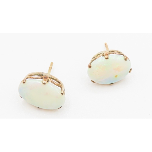 39 - Pair of Six Claw Basket Set Opal Earrings Mounted in 14 Carat Yellow Gold Each 1.2cm High