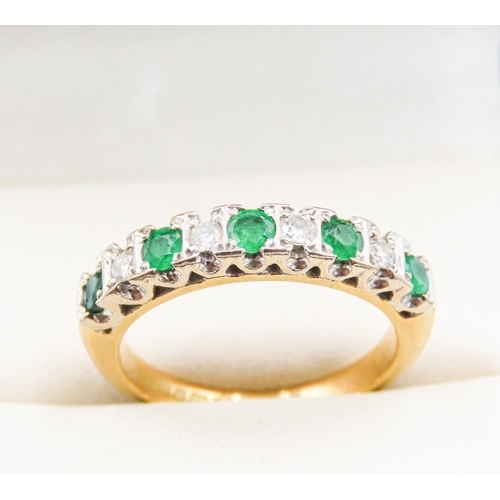 4 - Nine Stone Emerald and Diamond Set Ring Mounted in 18 Carat Yellow Gold Ring Size L