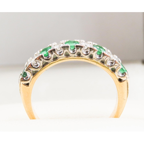 4 - Nine Stone Emerald and Diamond Set Ring Mounted in 18 Carat Yellow Gold Ring Size L