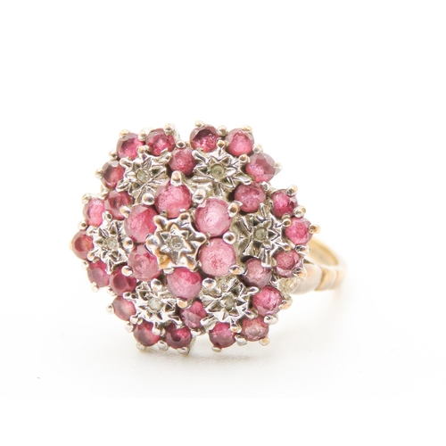 417 - Ruby and Diamond Set Ladies Cluster Ring Mounted in 9 Carat Yellow Gold Size N and a Half