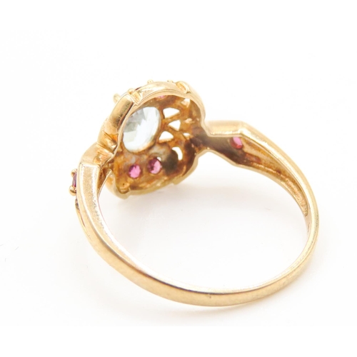 421 - Aquamarine and Ruby Set Ring Finely Detailed Mounted in 9 Carat Yellow Gold Ring Size P