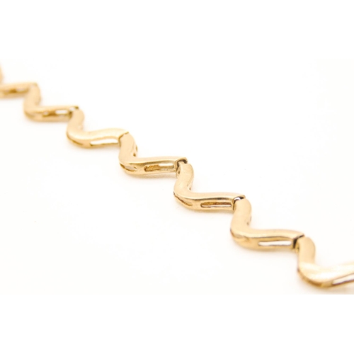 427 - 9 Carat Yellow Gold Wave link Bracelet 19cm Long