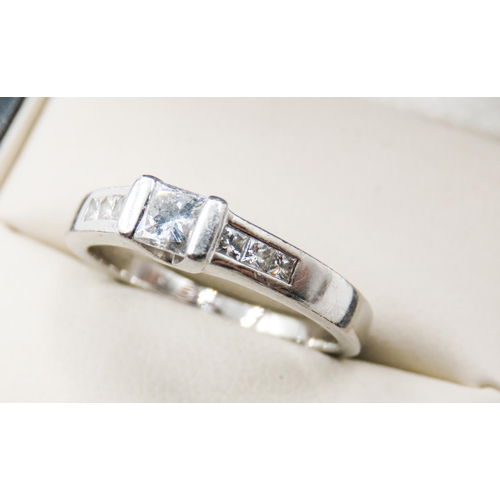 447 - Square Cut Half Bezel Set Diamond Solitaire Mounted in Platinum with Further Diamonds Set to Shoulde... 