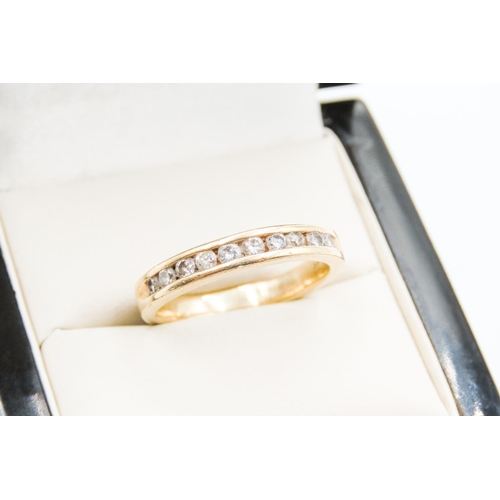 448 - Diamond Set Half Eternity Ring Mounted in 14 Carat Yellow Gold Ring Size  Q and a Half