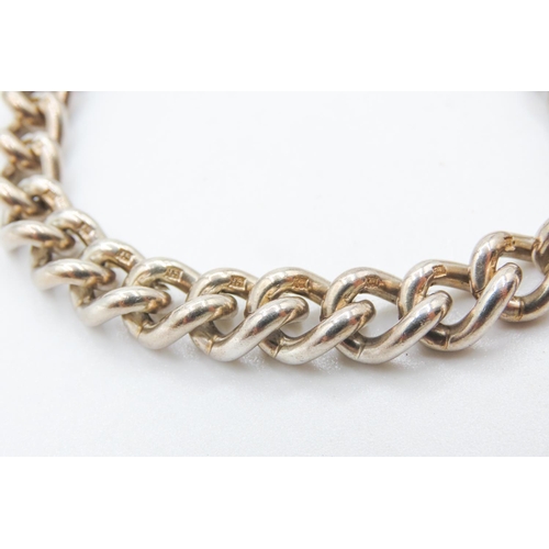 484 - Silver Curb Link Bracelet with Heart Form Clasp and Safety Chain 16.5cm Long