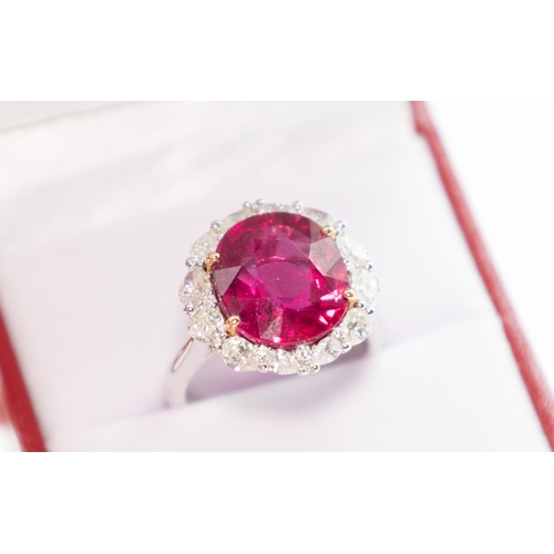 53 - Attractively Detailed Rubellite Centre Stone Ring with Graduated Form Pear Cut Diamond Halo Surround... 