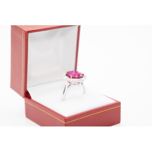 53 - Attractively Detailed Rubellite Centre Stone Ring with Graduated Form Pear Cut Diamond Halo Surround... 