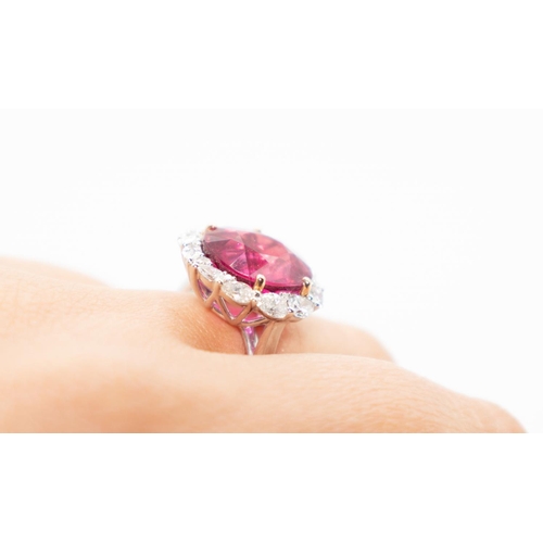 53 - Attractively Detailed Rubellite Centre Stone Ring with Graduated Form Pear Cut Diamond Halo Surround... 