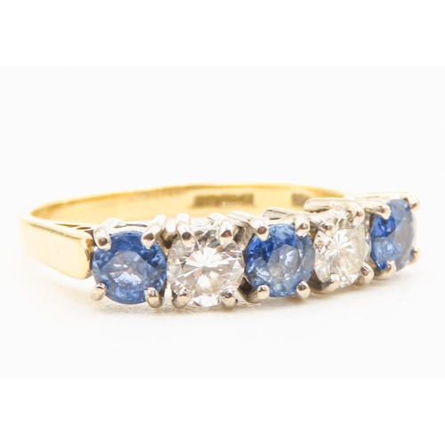 56 - Five Stone Sapphire and Diamond Set Ring Mounted in 18 Carat Yellow Gold Ring Size N