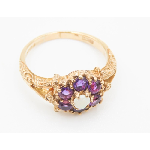 67 - Amethyst and Opal Set Daisy Motif Ring Finely Set in 9 Carat Yellow Gold Ring Size O