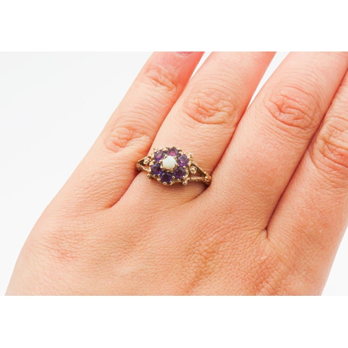 67 - Amethyst and Opal Set Daisy Motif Ring Finely Set in 9 Carat Yellow Gold Ring Size O
