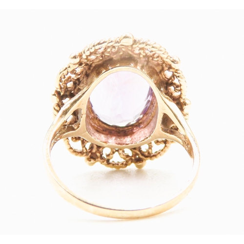 7 - Amethyst Single Stone Ring Finely Detailed Attractively Set in 9 Carat Yellow Gold Ring Size M