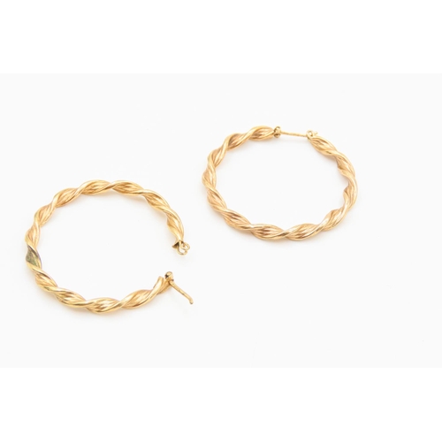79 - Pair of 9 Carat Yellow Gold Twist Form Earrings Each 4cm Diameter