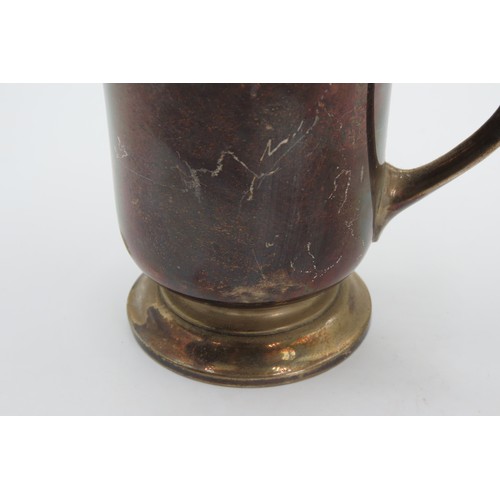 547 - Silver Cup With Shaped Handle above Turned Base Approximately 12cm High