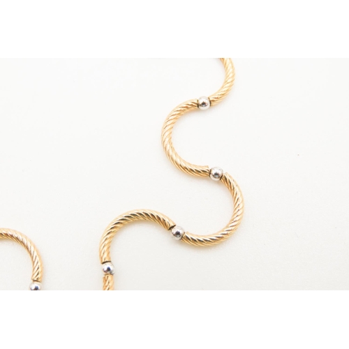 10 - Matching Attractively Detailed 9 Carat Yellow Gold Wave Link Bracelet with 9 Carat White Gold Spacer... 