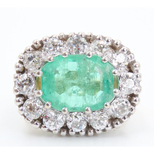 103 - Emerald Set Centre Stone Ring Mounted in 18 Carat Yellow Gold Diamond Set Halo Surround Total Emeral... 