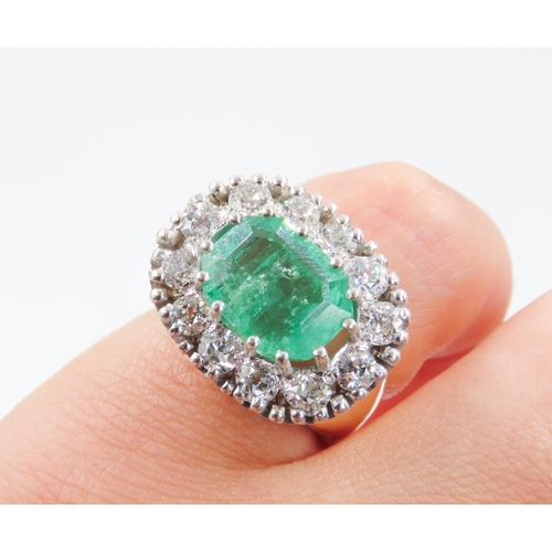 103 - Emerald Set Centre Stone Ring Mounted in 18 Carat Yellow Gold Diamond Set Halo Surround Total Emeral... 