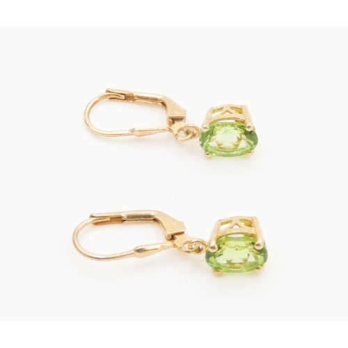 109 - Pair of Basket Set Peridot Earrings Mounted in Gilded Silver Each 2cm Drop