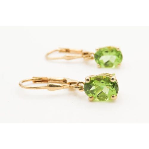 109 - Pair of Basket Set Peridot Earrings Mounted in Gilded Silver Each 2cm Drop