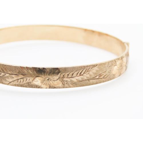 111 - 9 Carat Yellow Gold Bronze Core Bangle Bracelet Incised Floral Detailing Inner Width 6.6cm