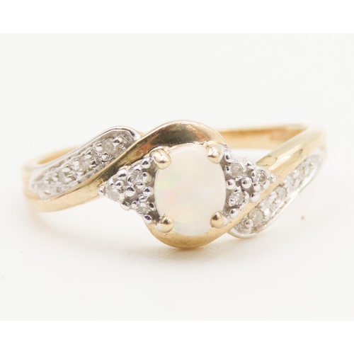 120 - Opal and Diamond Set Ladies Ring Finely Detailed Mounted in 9 Carat Yellow Gold Ring Size L